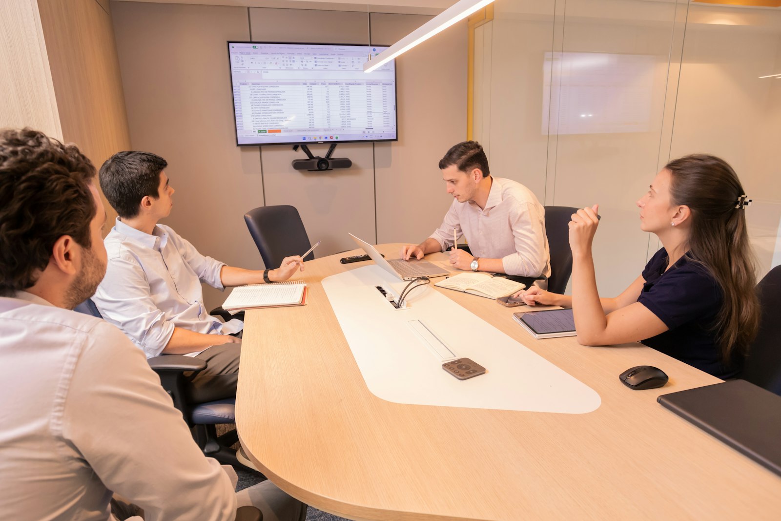 Client team in a meeting around a conference table