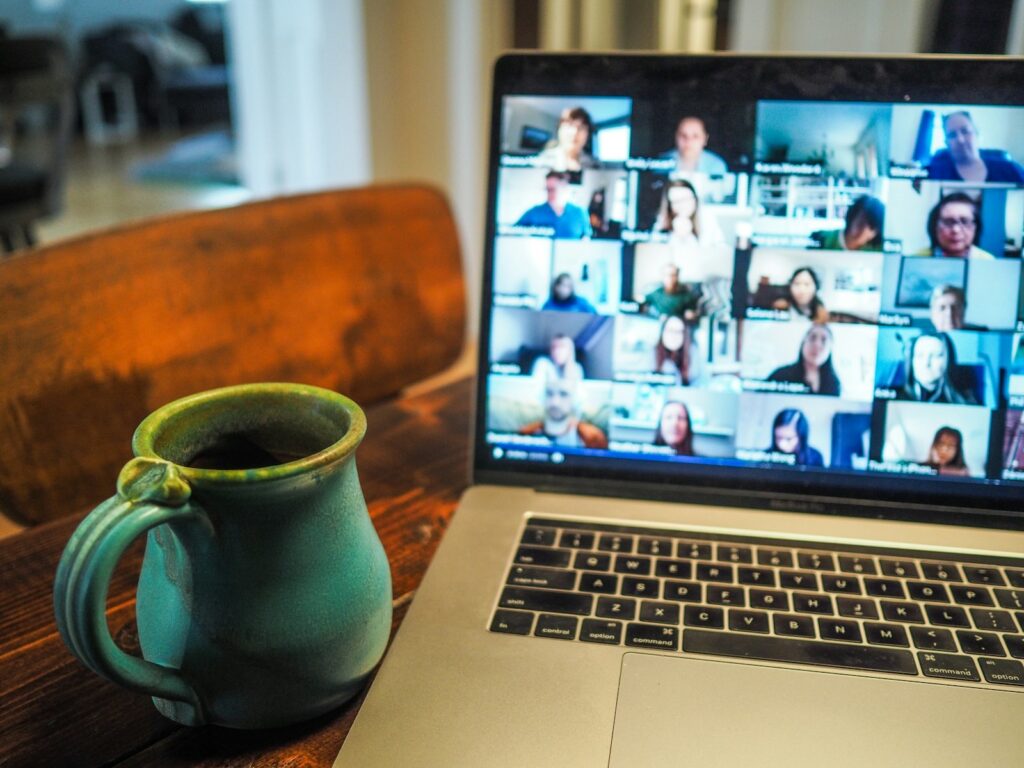 Laptop showing an international team on a video call